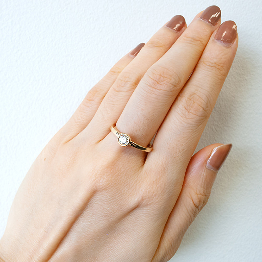 ダイヤモンド K18リング(イエローゴールド/4月誕生石/鑑別書付き)《14DB0713》