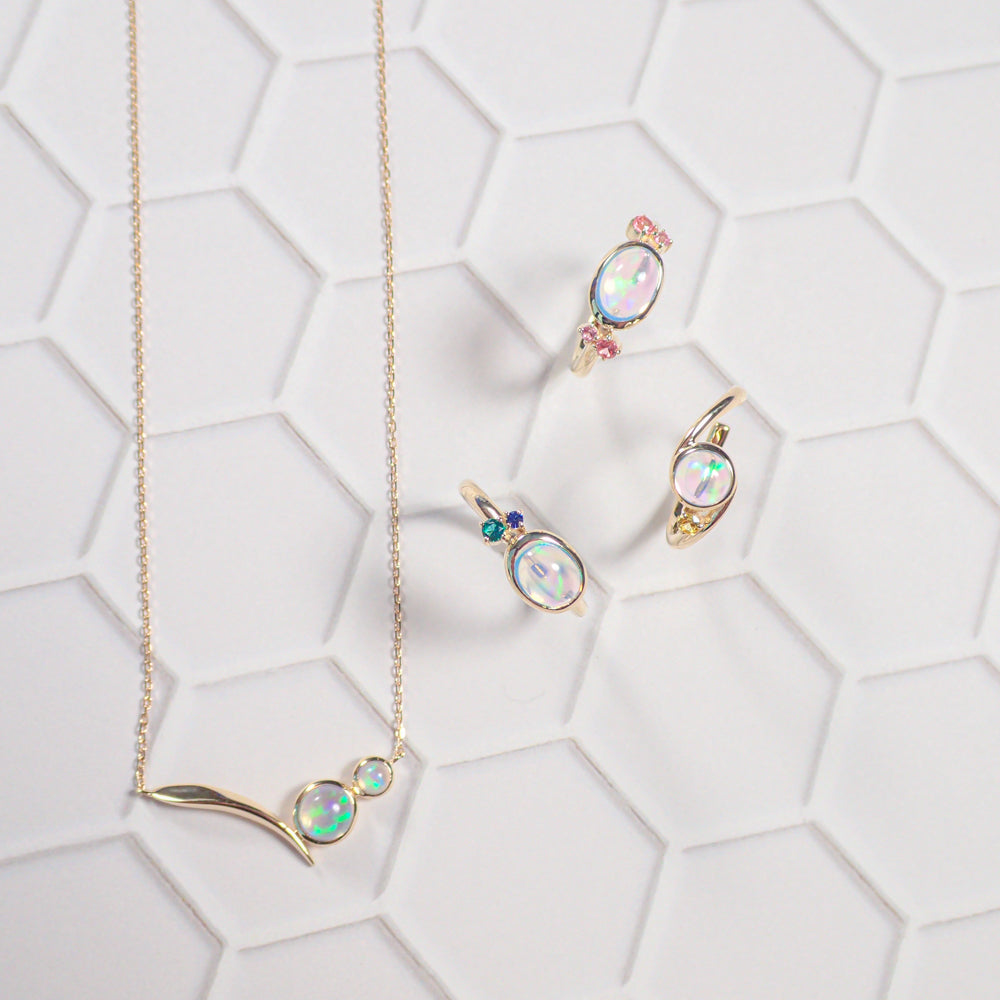 ウォーターオパール/ K10カフリング(クレサンベール/モンプレジール/片サイドメレオレンジ系)《WESW4146》