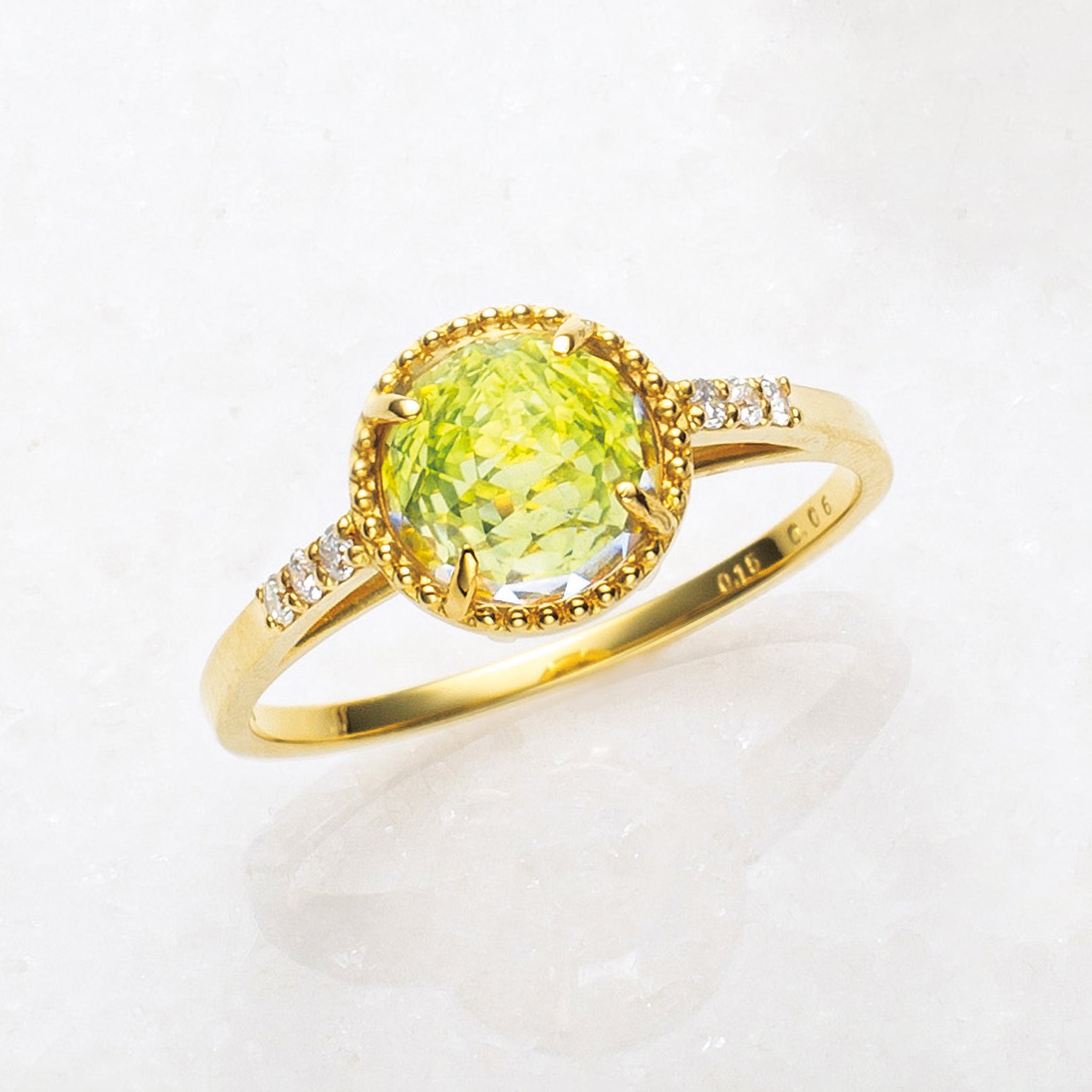 ロッククリスタル/ペリドット K18リング《25H01401》