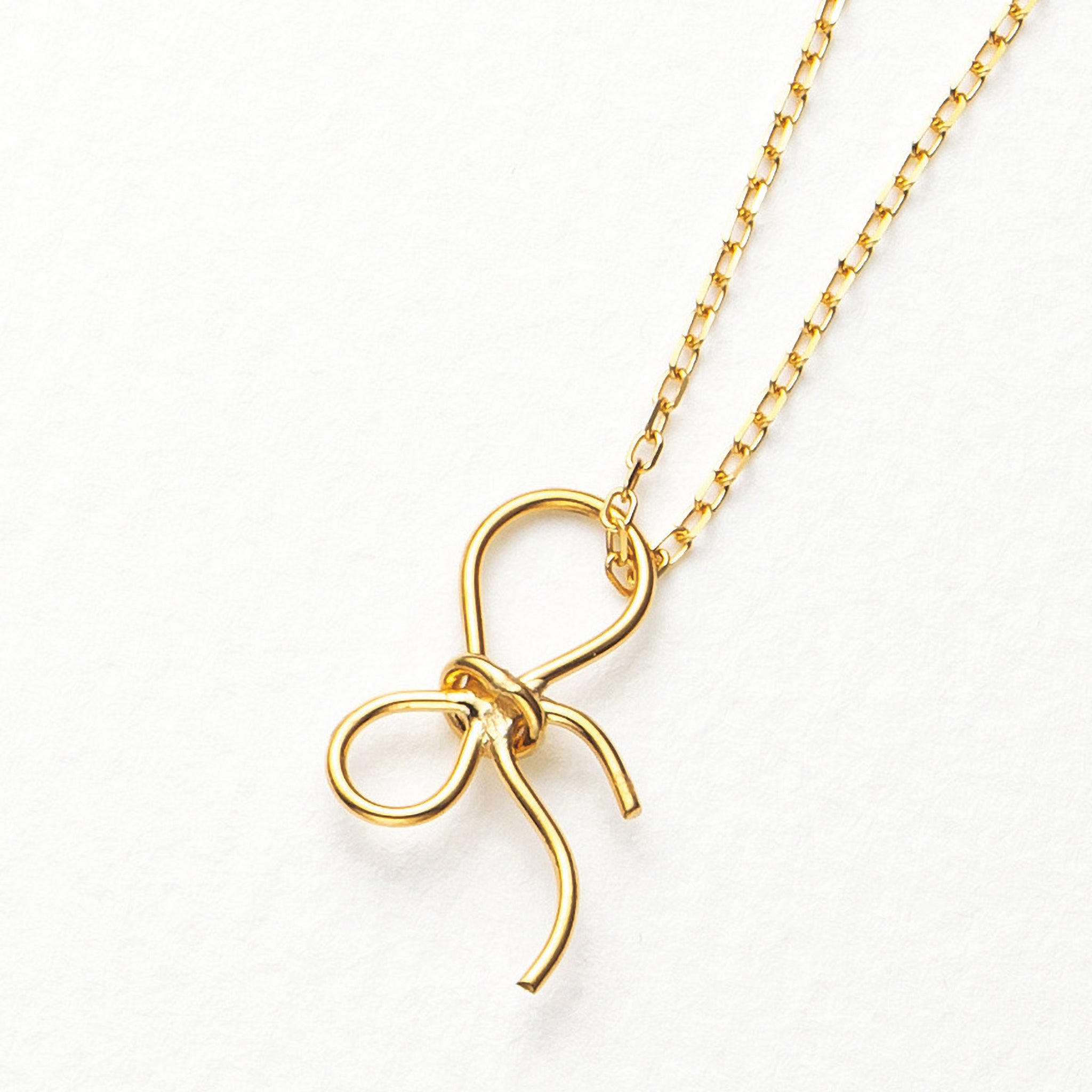 K18ネックレス(リボンモチーフ)《25H02704》