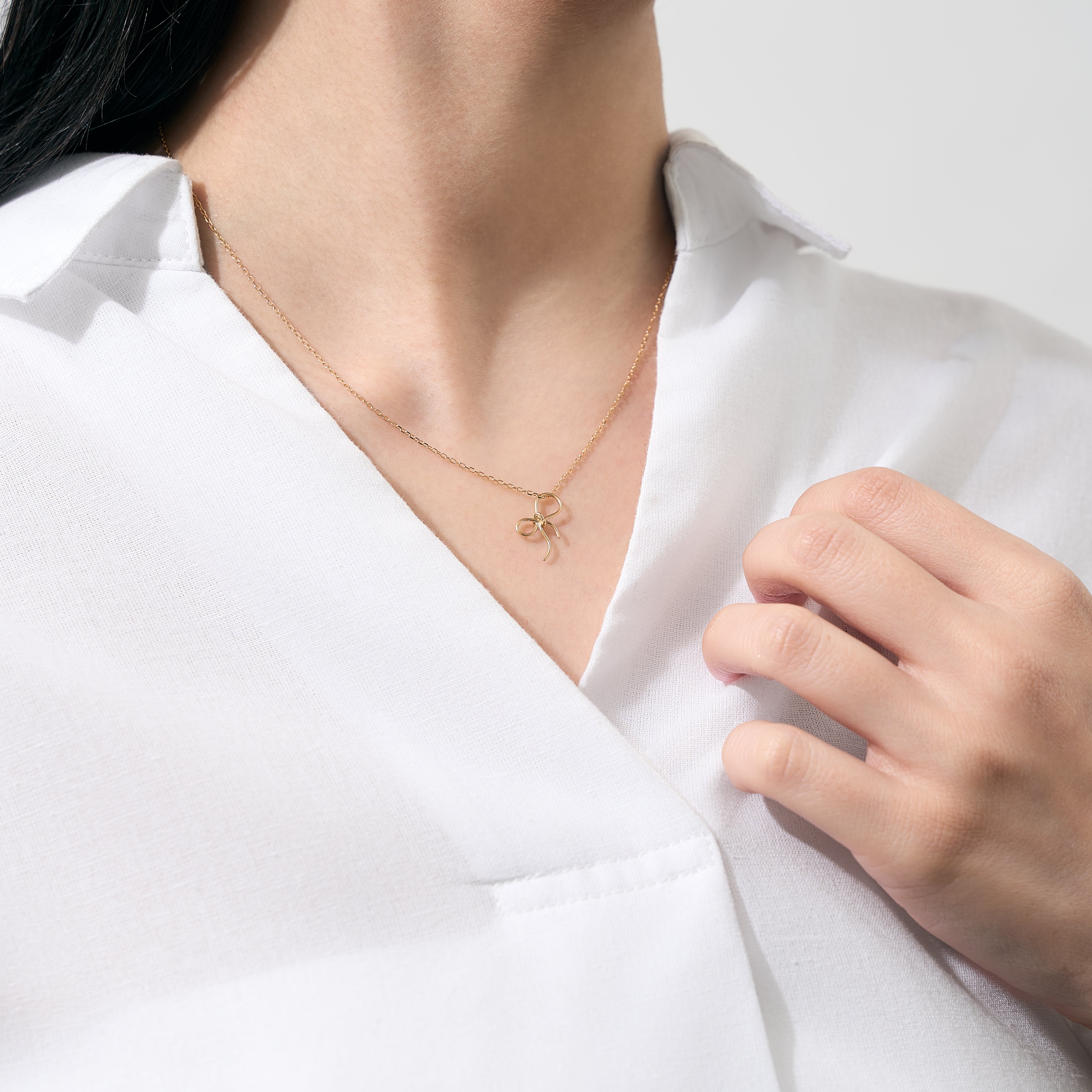 K18ネックレス(リボンモチーフ)《25H02704》