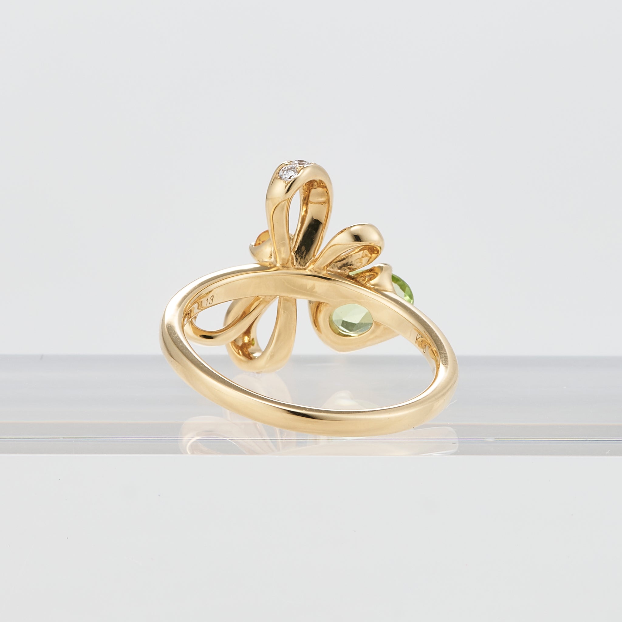 サファイア/ペリドット K18リング(NINA RICCI)《25V01004》