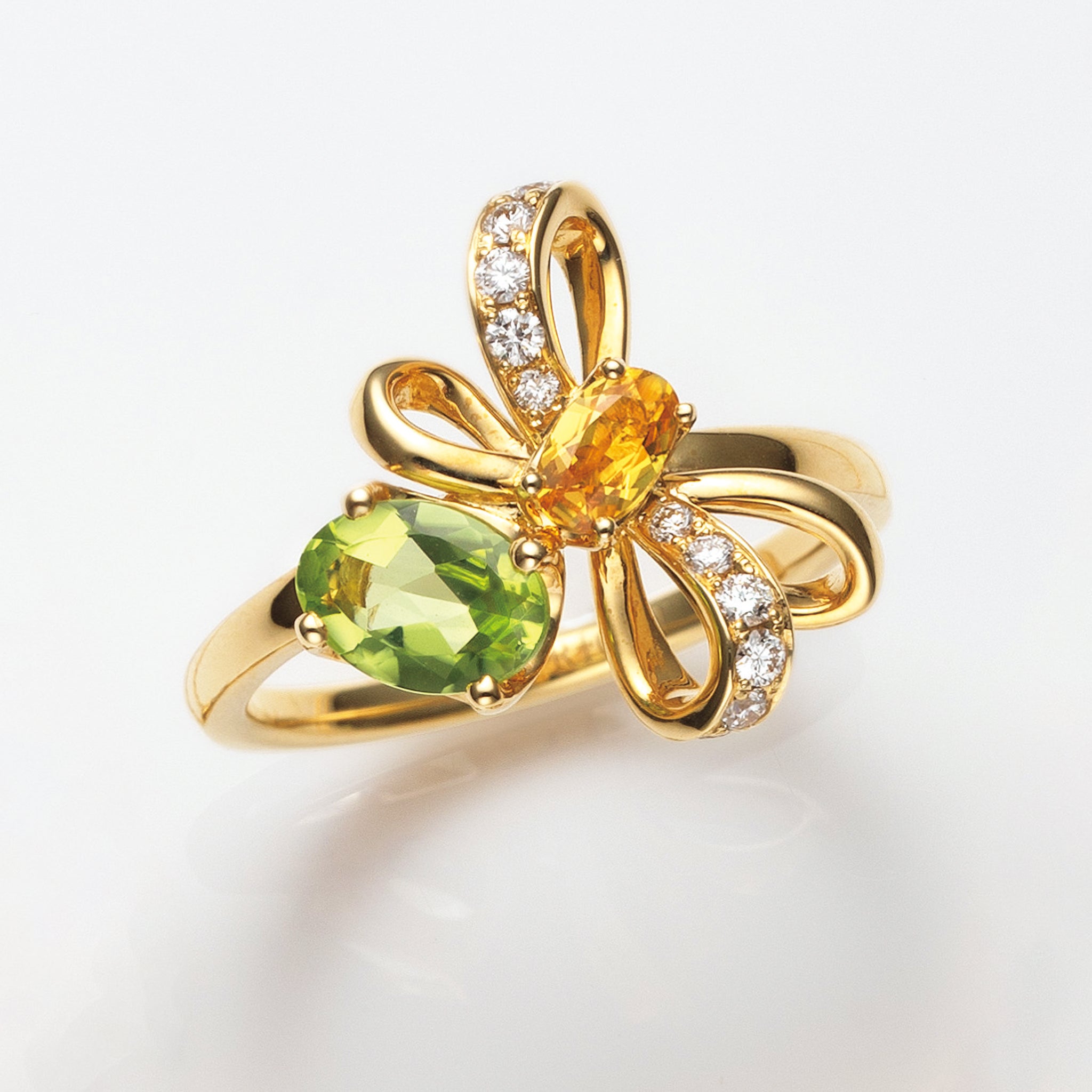 サファイア/ペリドット K18リング(NINA RICCI)《25V01004》