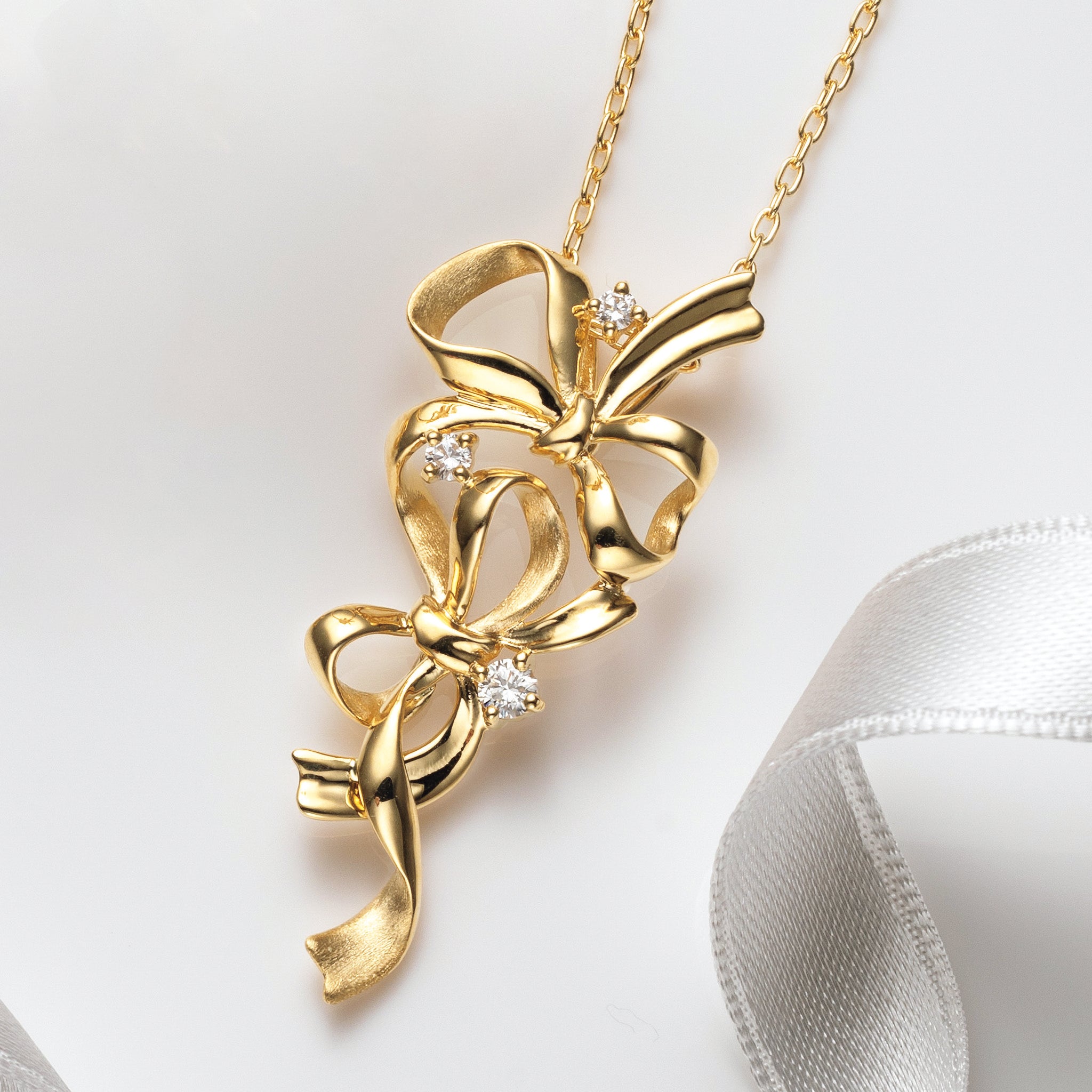 4℃ 10K リボンモチーフネックレス DiamondHearts（ダイヤモンドハーツ） ネックレス ダブルリボン
