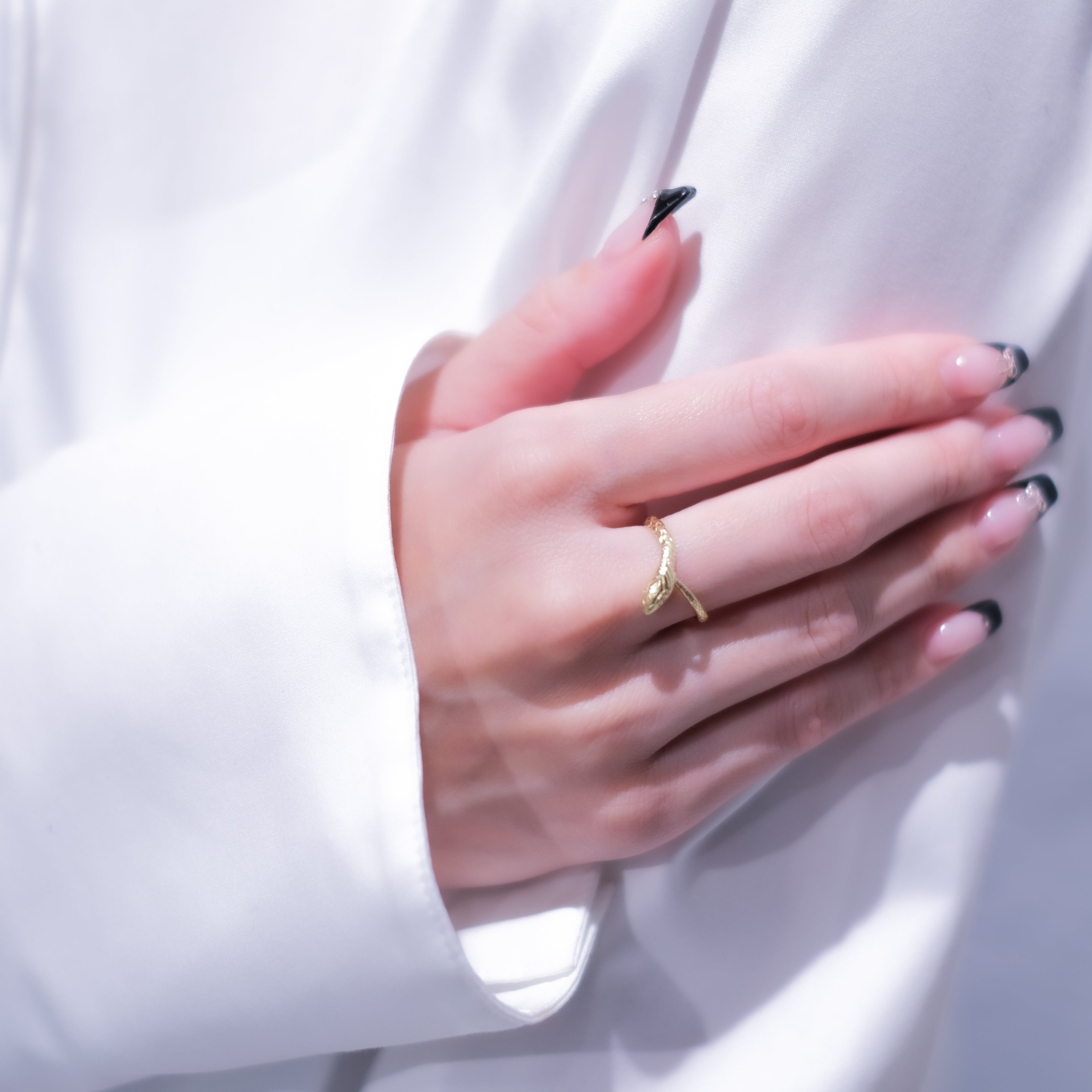 ダイヤモンド K18リング(ヘビモチーフ/4月誕生石)《26A04203》