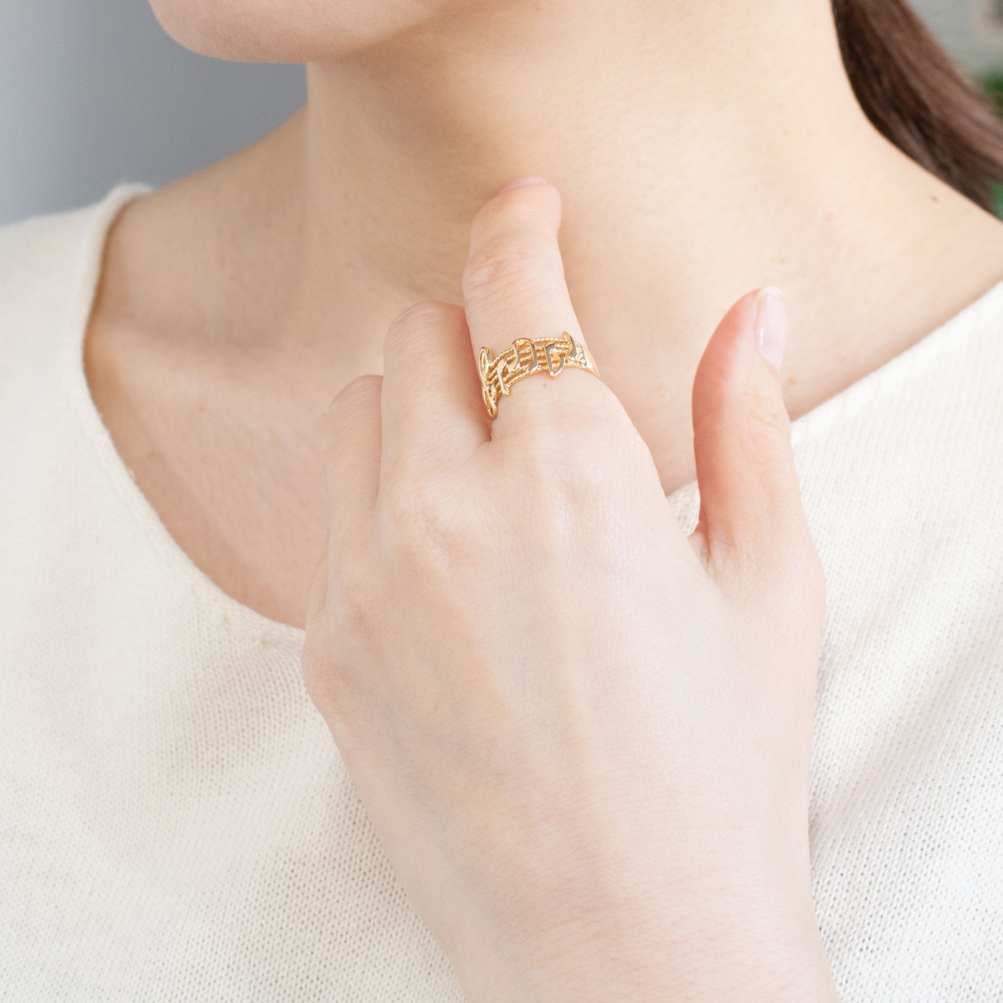 K18リング(音符モチーフ)《26C20124》