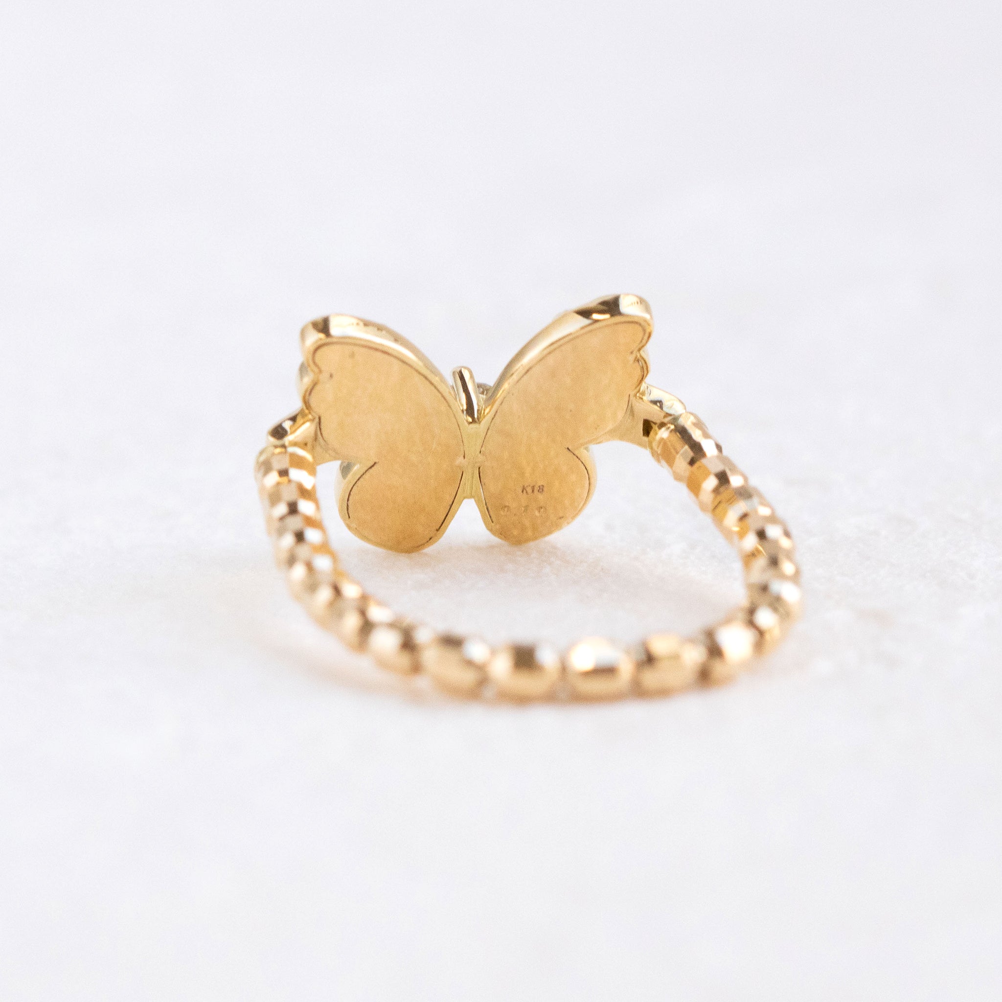 ダイヤモンド K18リング(フリーサイズ/蝶モチーフ/4月誕生石)《26T10129》