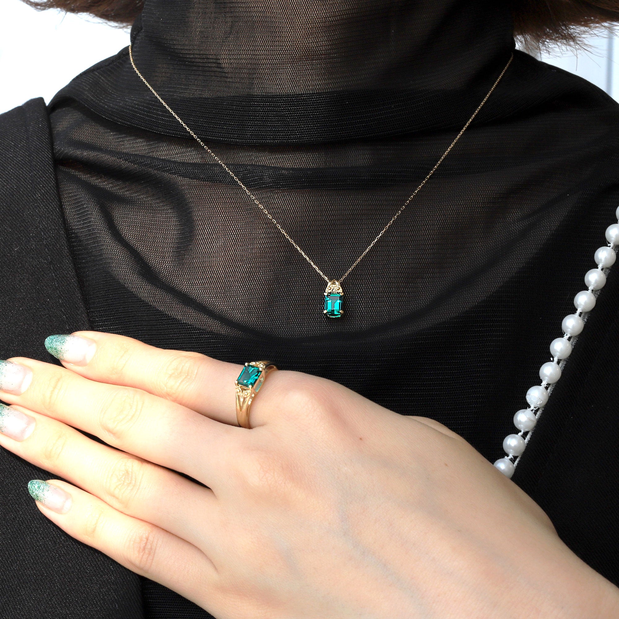 エメラルド K18リング(クレサンベール/エメラルドカット/5月誕生石)《BRGE9775》