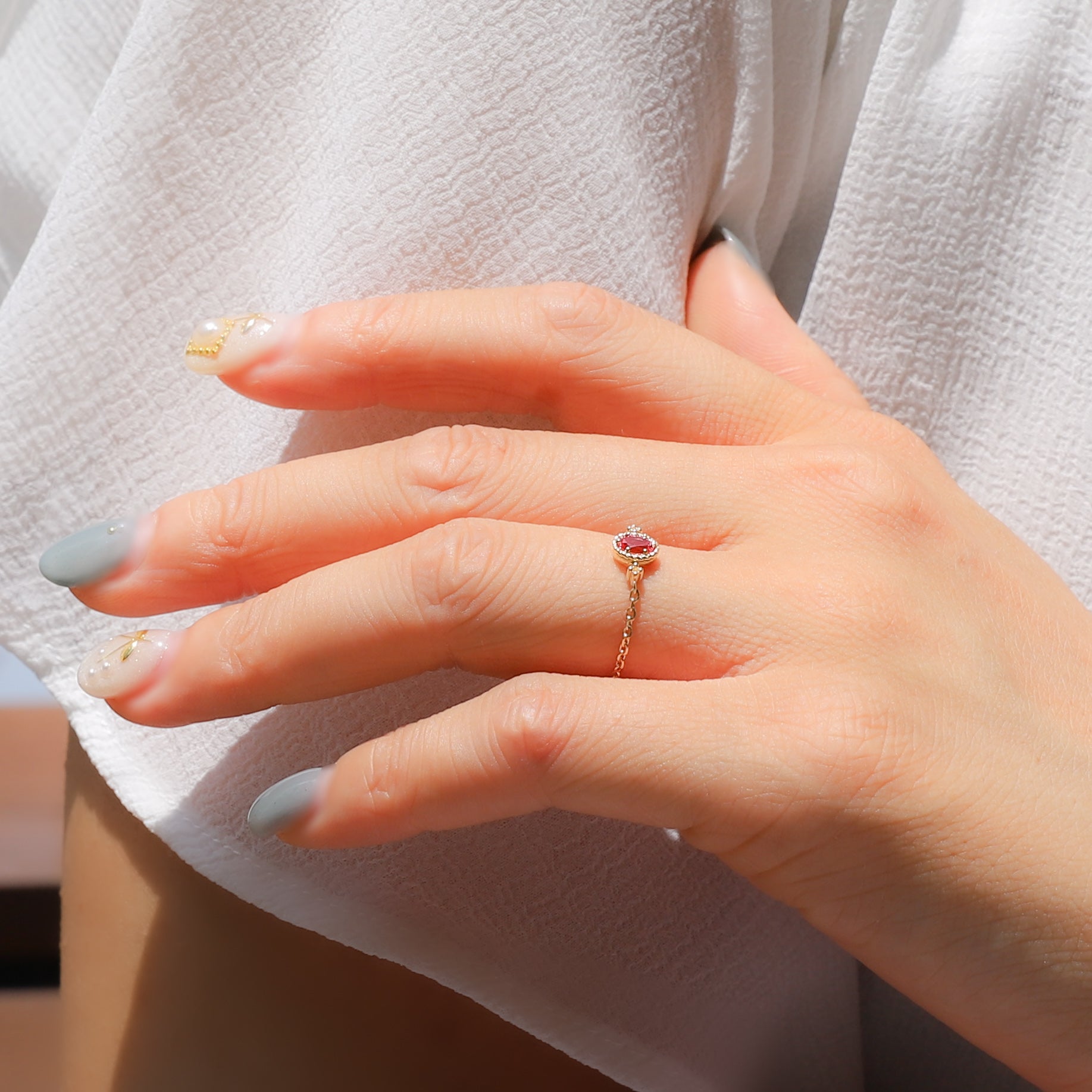 パパラチアサファイア K10リング(クレサンベール/モンプレジール/チェーンリング/フリーサイズ/9月誕生石)《WRGP4035》