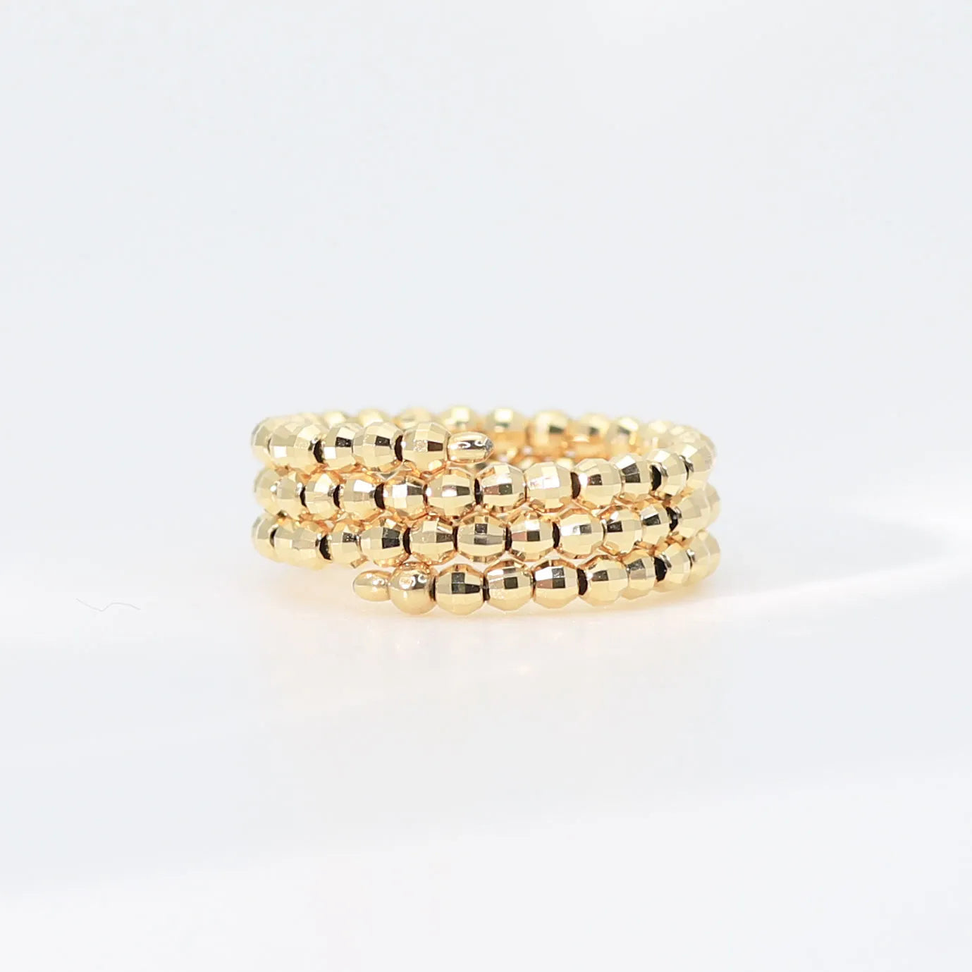 K18リング(イエローゴールド/フリーサイズ/カットボール/形状記憶)《WRGY3845》