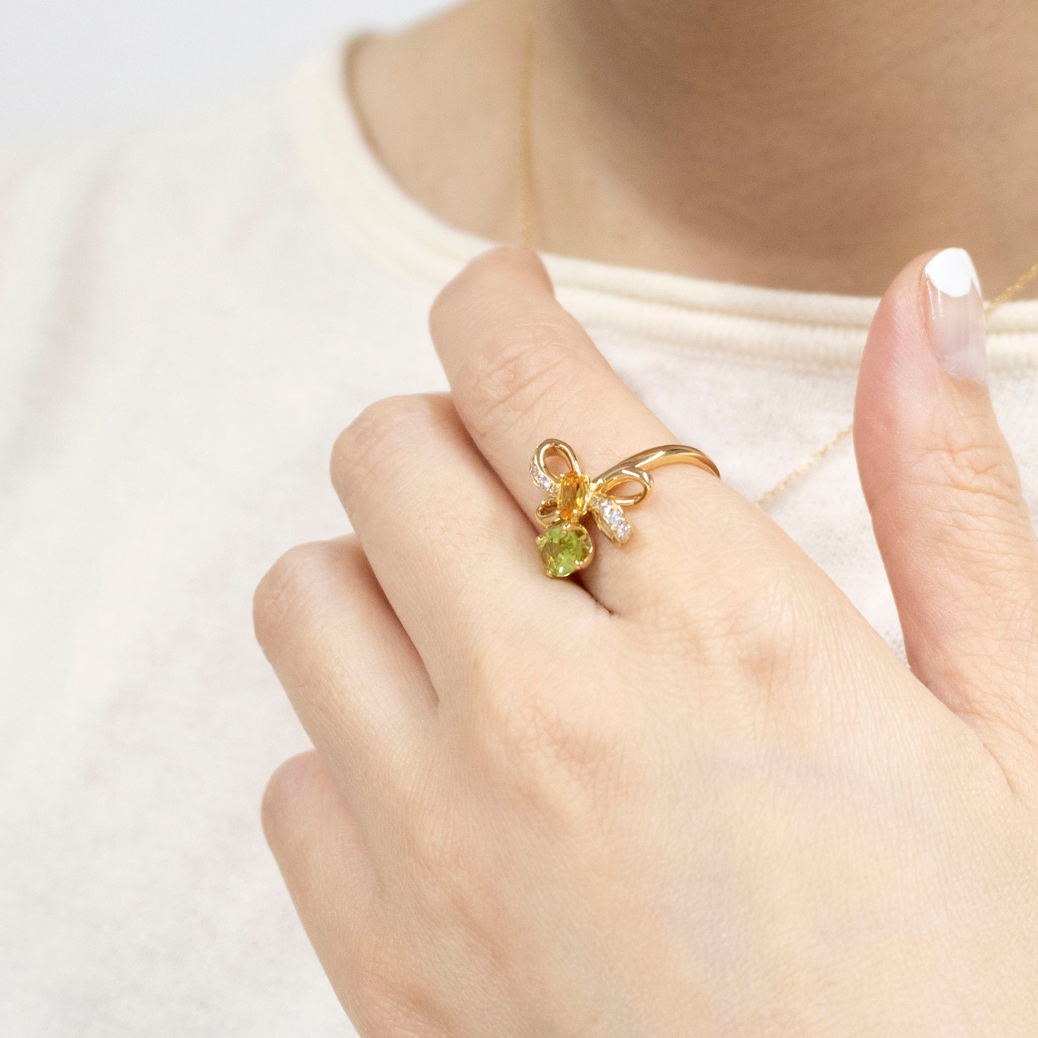 サファイア/ペリドット K18リング(NINA RICCI)《25V01004》