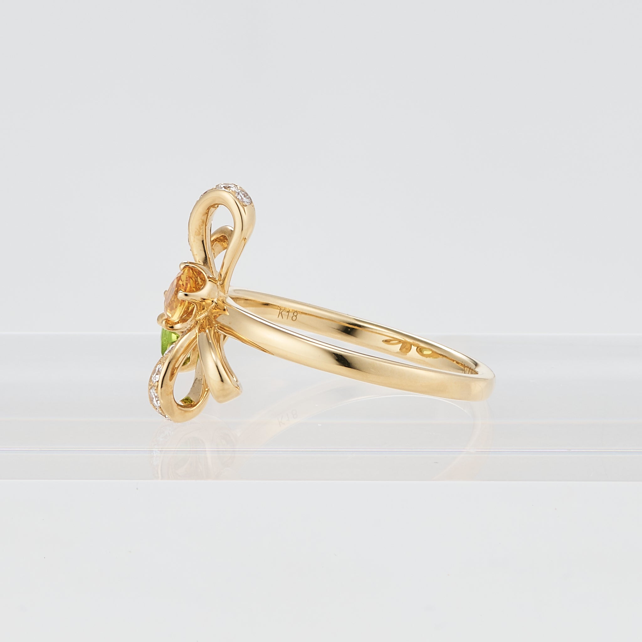 サファイア/ペリドット K18リング(NINA RICCI)《25V01004》