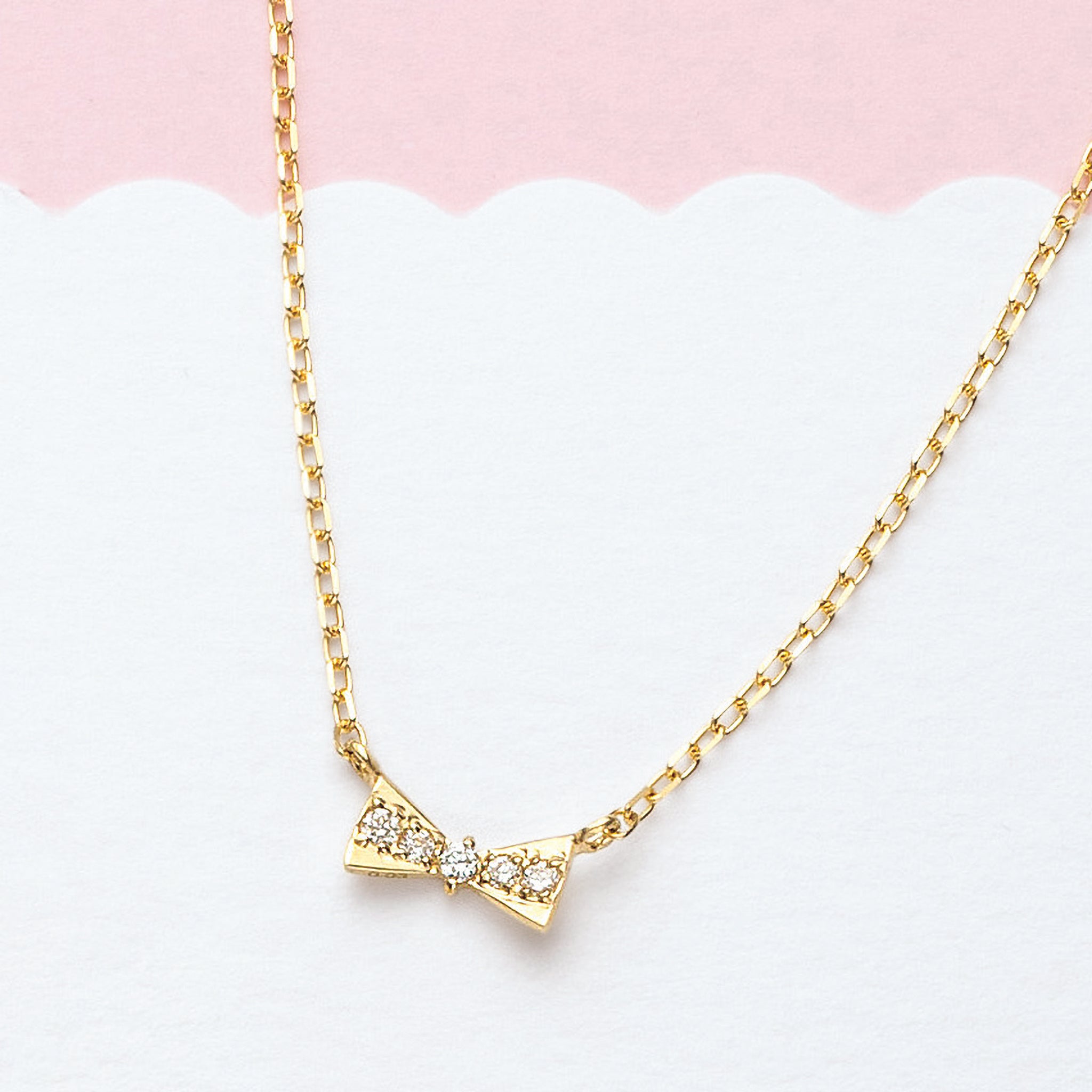 ダイヤモンド K10ネックレス(リボンモチーフ/4月誕生石)《25V03704》