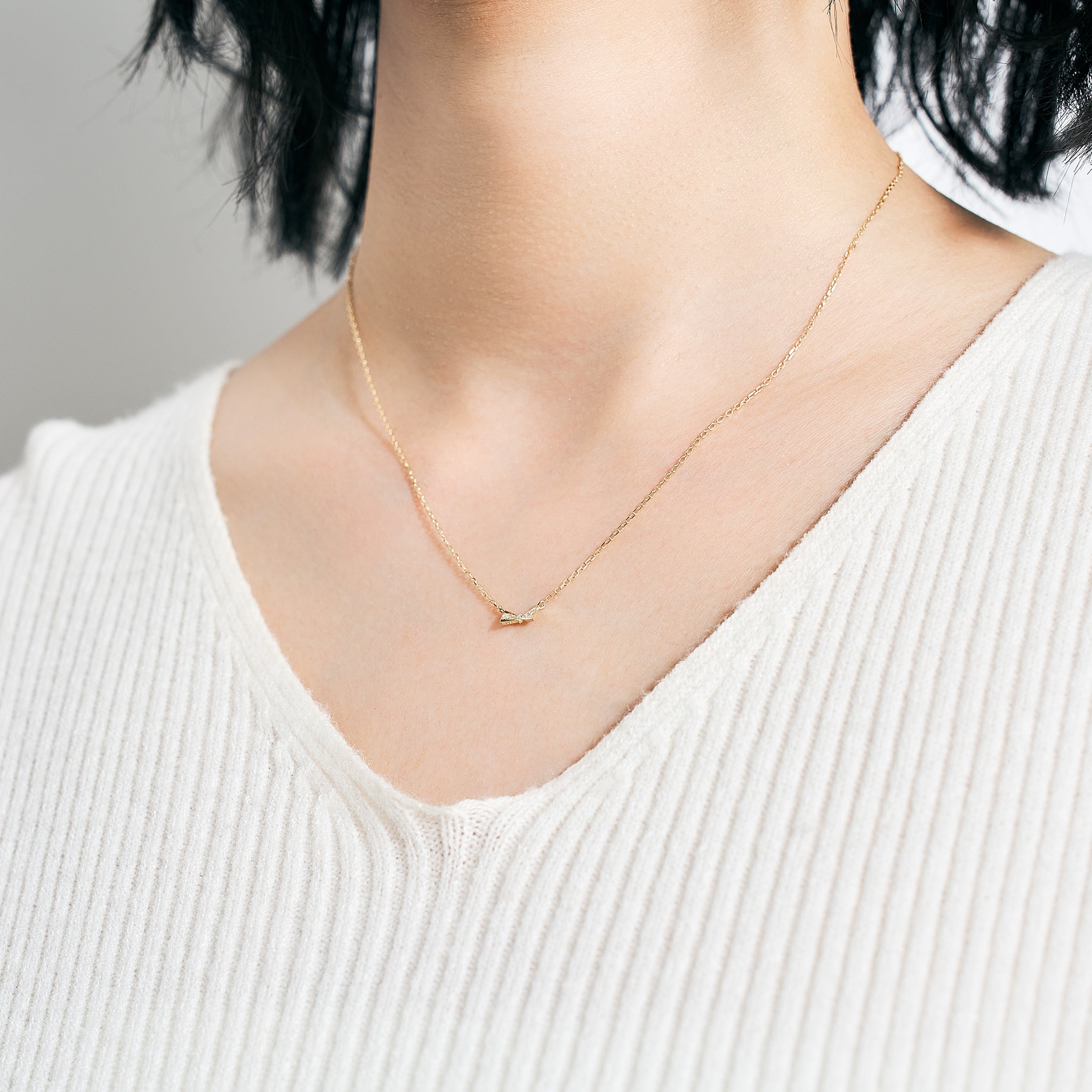 ダイヤモンド K10ネックレス(リボンモチーフ/4月誕生石)《25V03704》