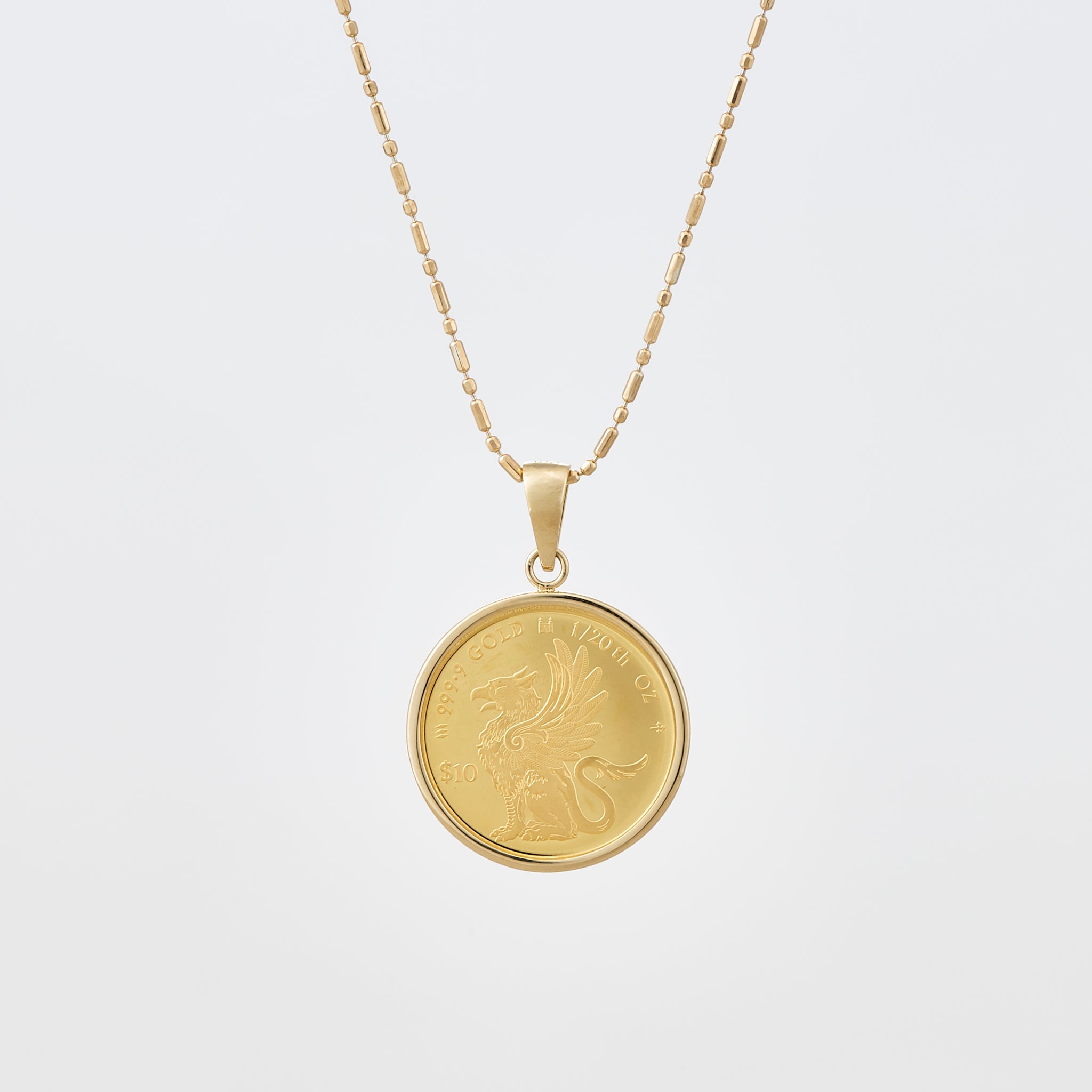 K24/K18ペンダント(純金/コイン/グリフィンモチーフ/1/20oz)《25V04001》