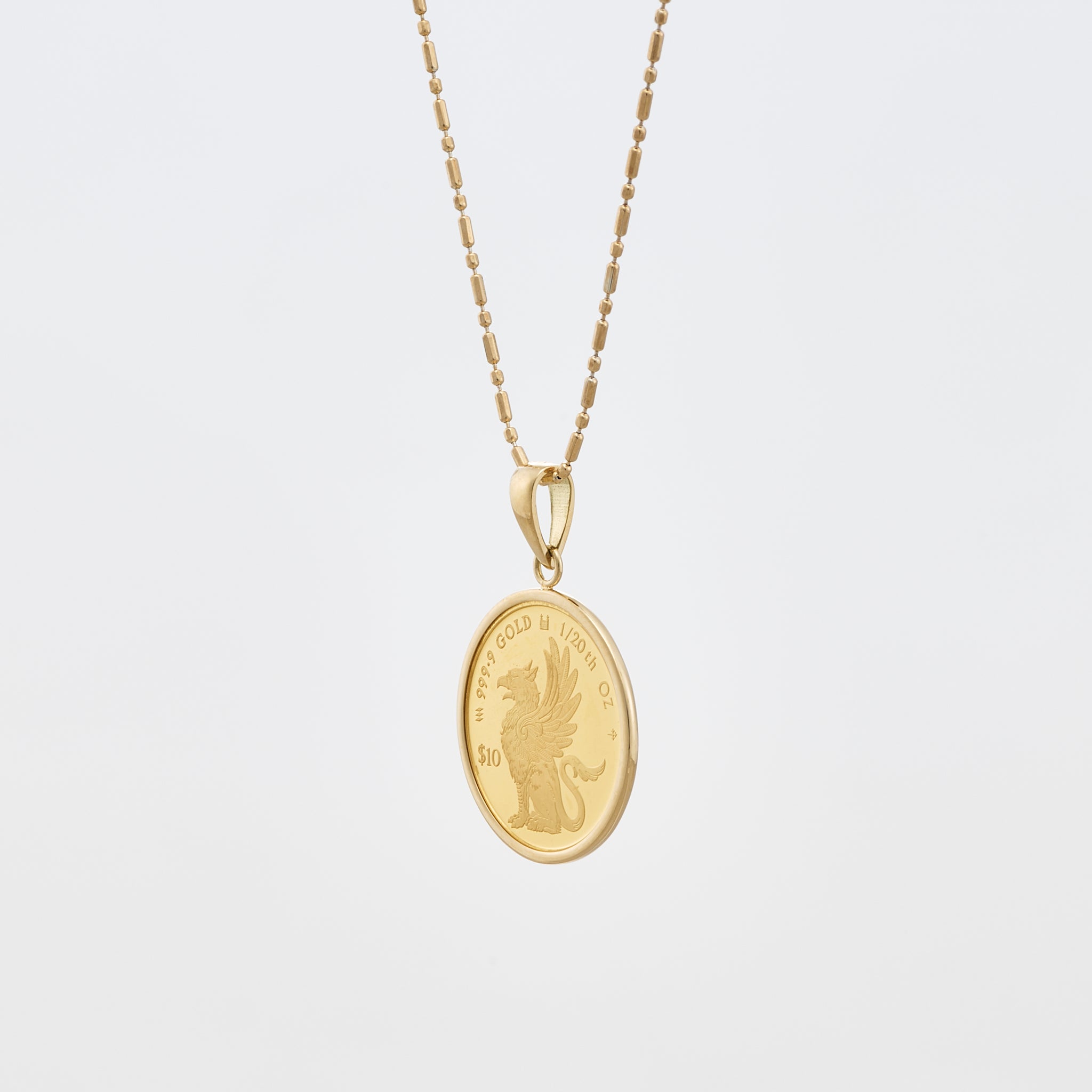K24/K18ペンダント(純金/コイン/グリフィンモチーフ/1/20oz)《25V04001》