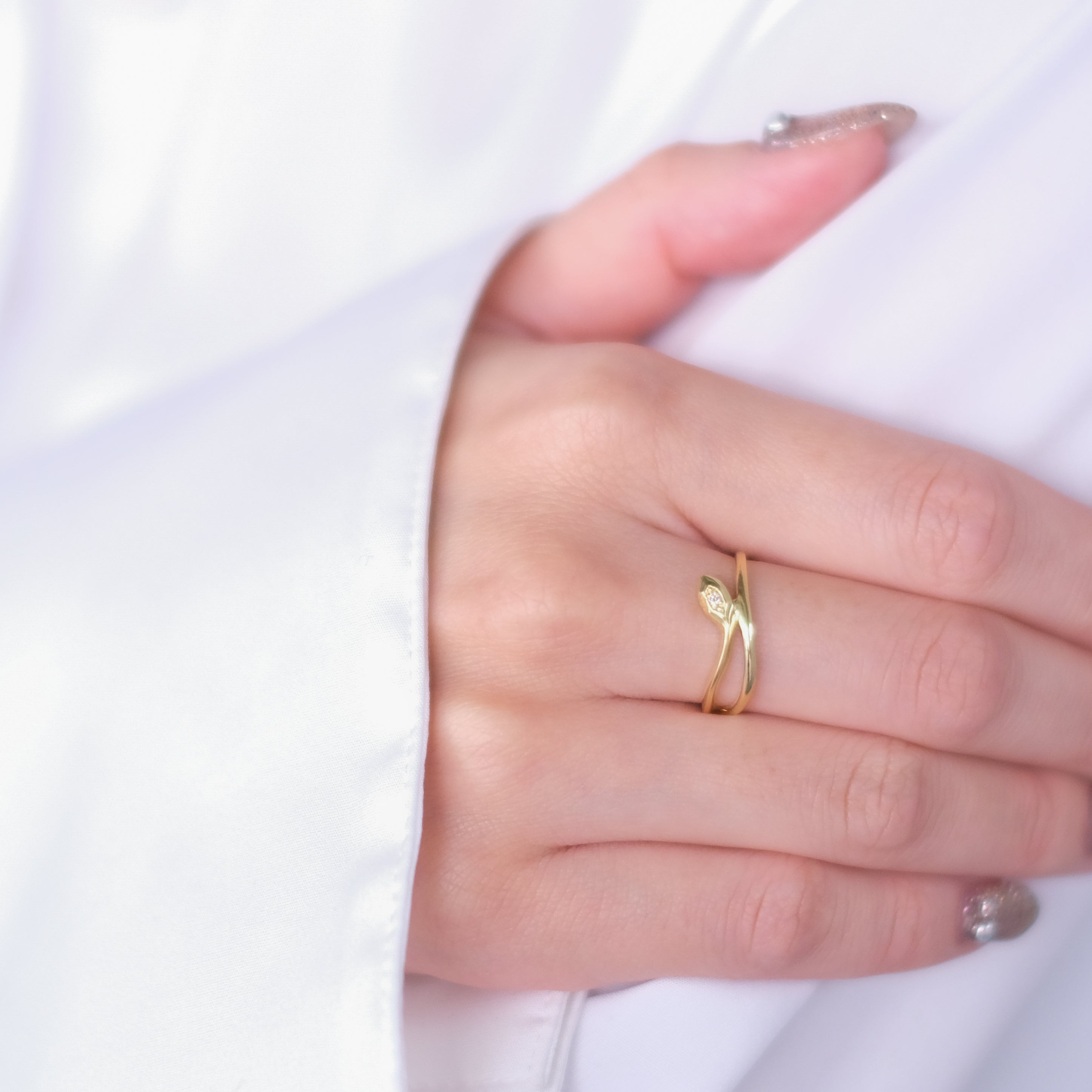 ダイヤモンド K18リング(ヘビモチーフ/4月誕生石)《25V04204》