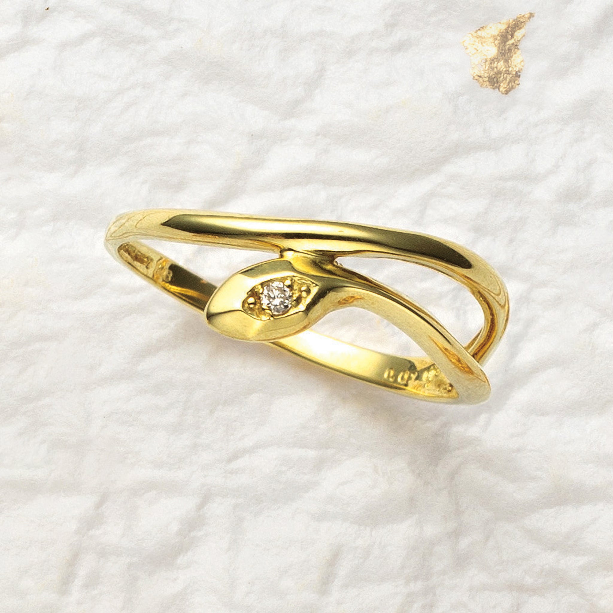 ダイヤモンド K18リング(ヘビモチーフ/4月誕生石)《25V04204》