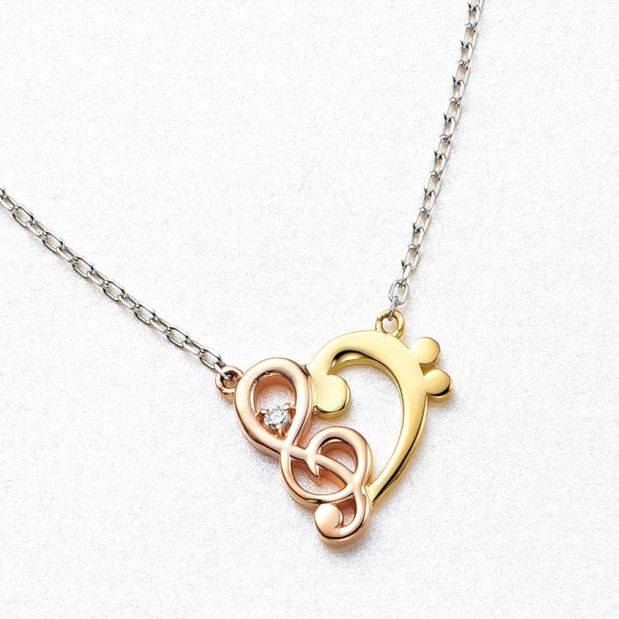 ダイヤモンド K18/プラチナネックレス(スリーカラー/ト音記号・ヘ音記号モチーフ/4月誕生石)《26A03402》