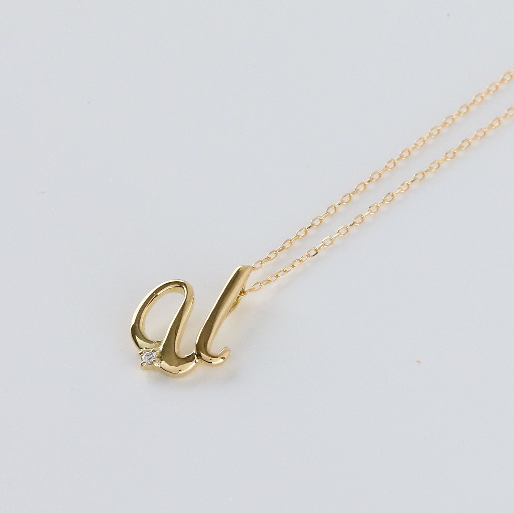 ダイヤモンド K10ネックレス(イニシャル/U/4月誕生石)《26A03708ｰU》