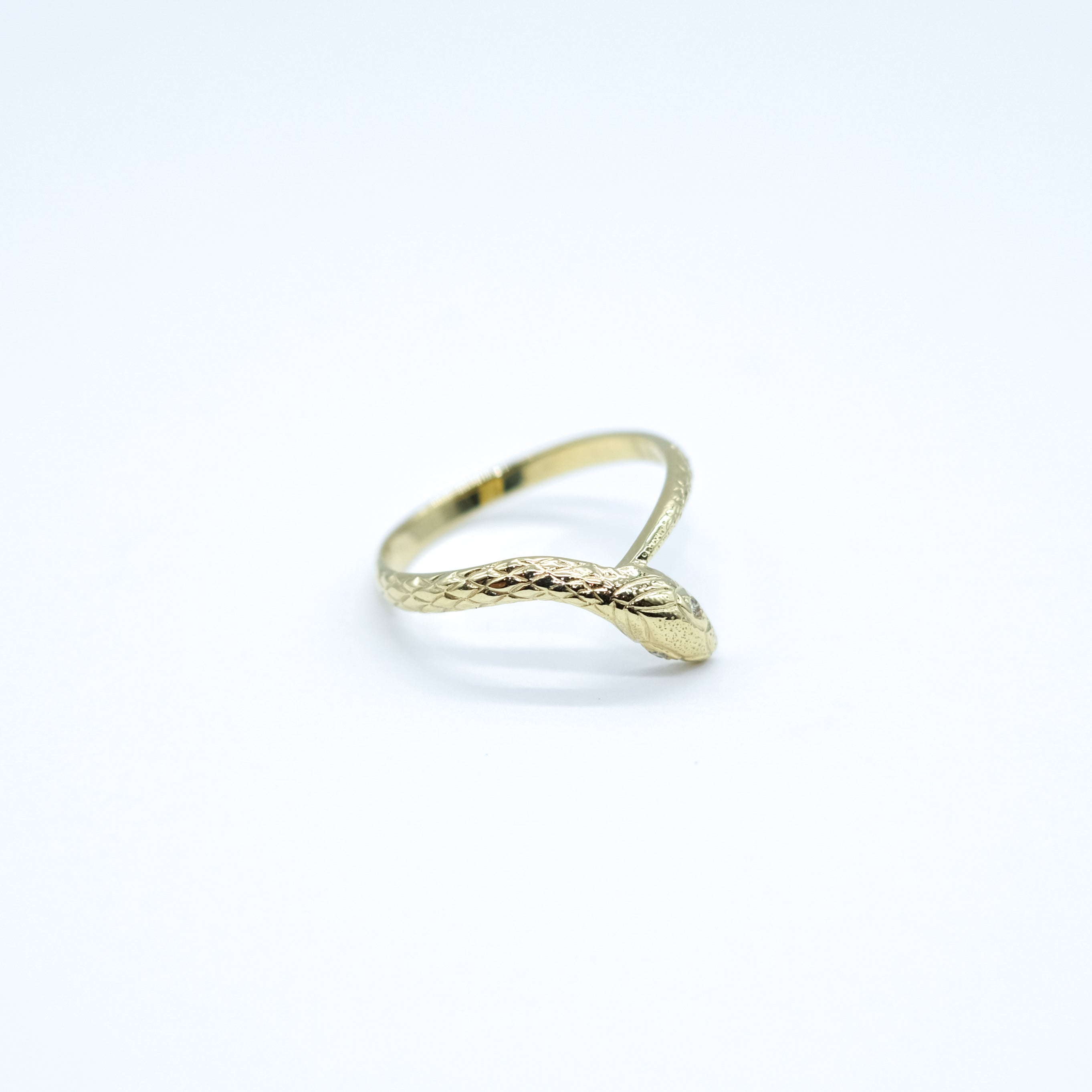 ダイヤモンド K18リング(ヘビモチーフ/4月誕生石)《26A04203》