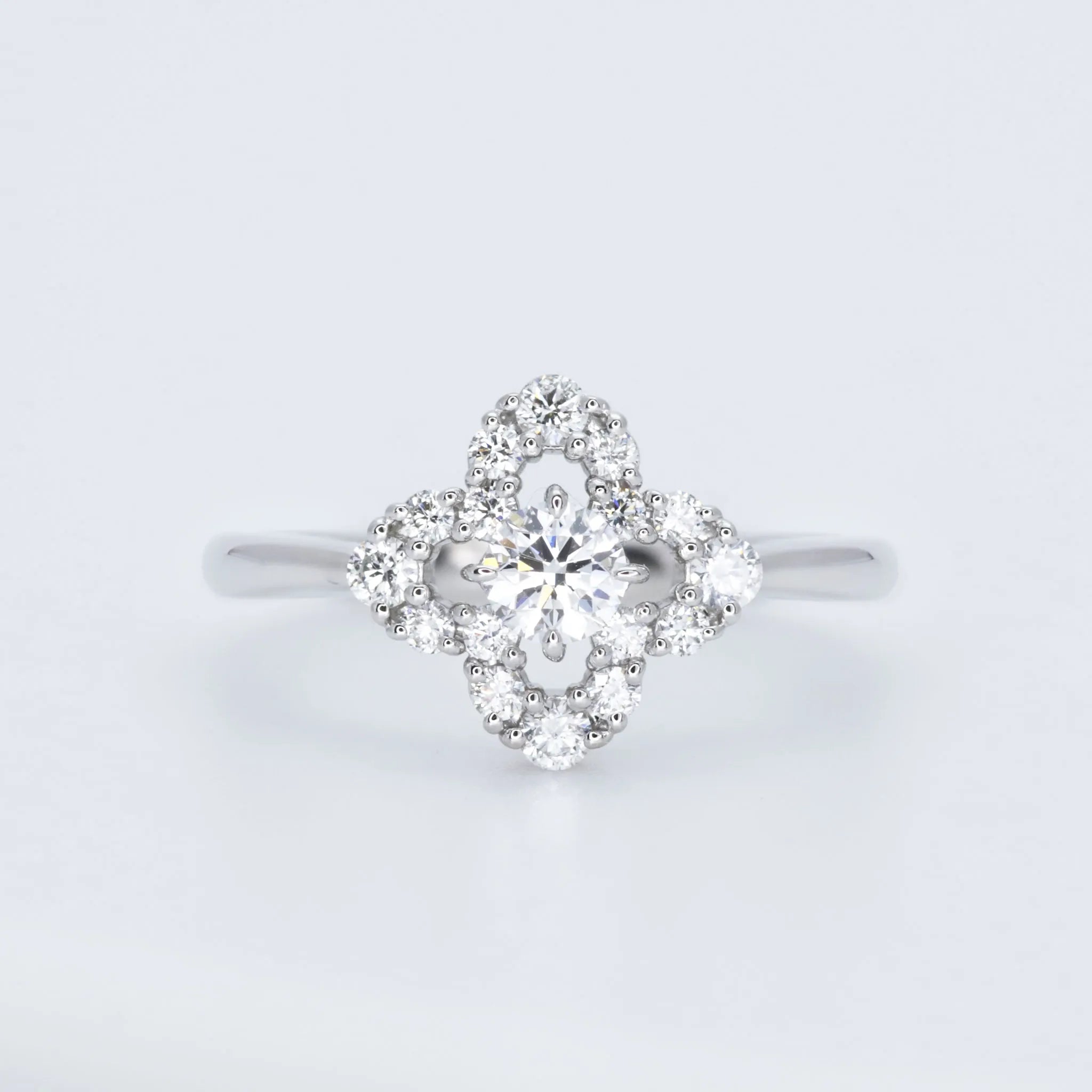 ダイヤモンド PTリング(0.2カラット/Dカラー/SI2UP/3EX(H&C)/一粒/フラワーモチーフ/4月誕生石/グレーディングレポート付き)《JRGD1178》